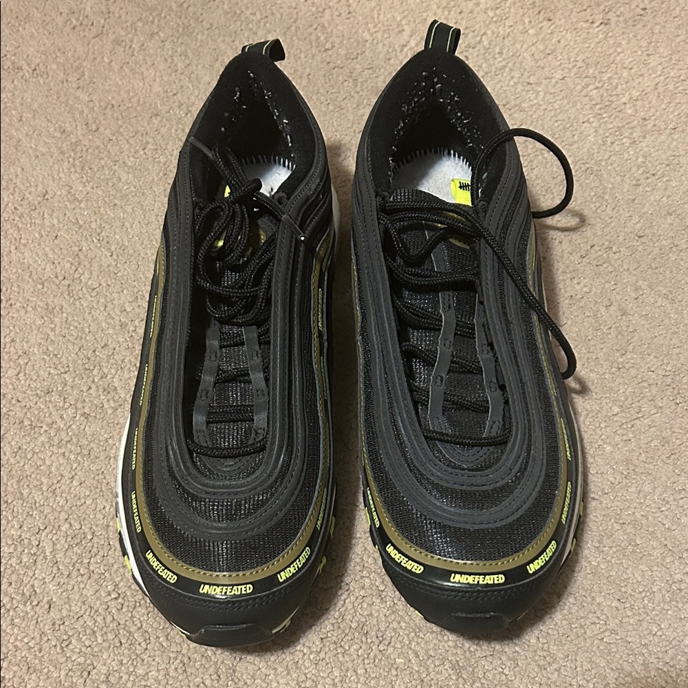 Undefeated Black and Yellow Sneakers